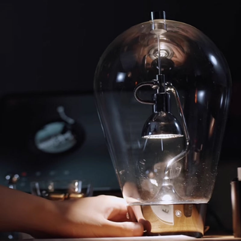 Designer Creative Light Bulb Glass Table With Magnetic Adjustment